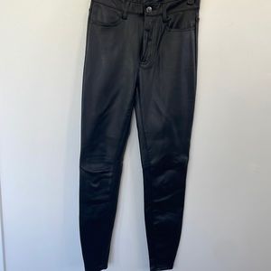 Free People high waist black faux leather skinny pants. Size 24